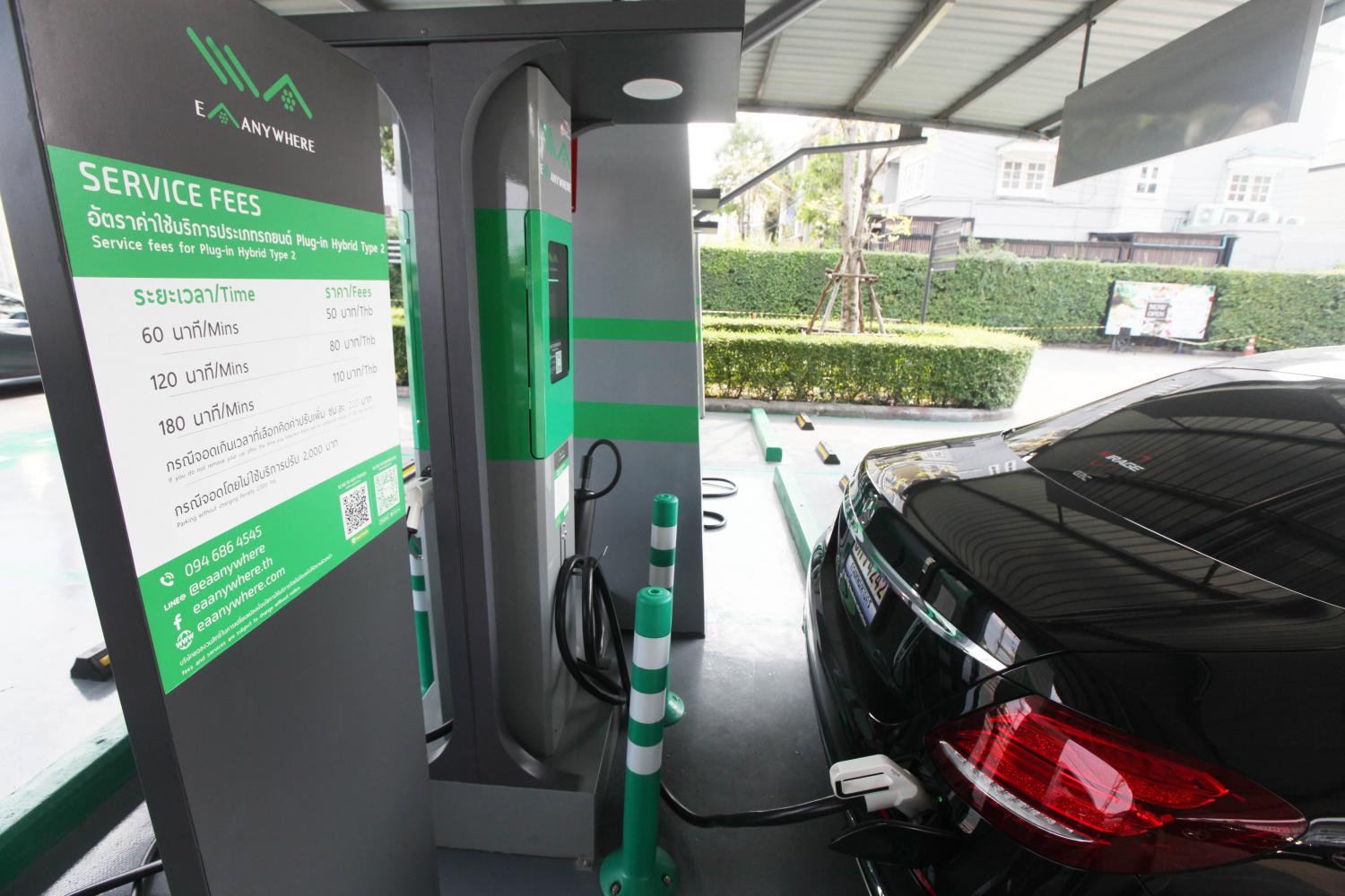 A plug-in hybrid car is charged at the EA Anywhere station at the Crystal Design Centre. EA is committed to having 1,000 charging stations by 2019. Thiti Wannamontha