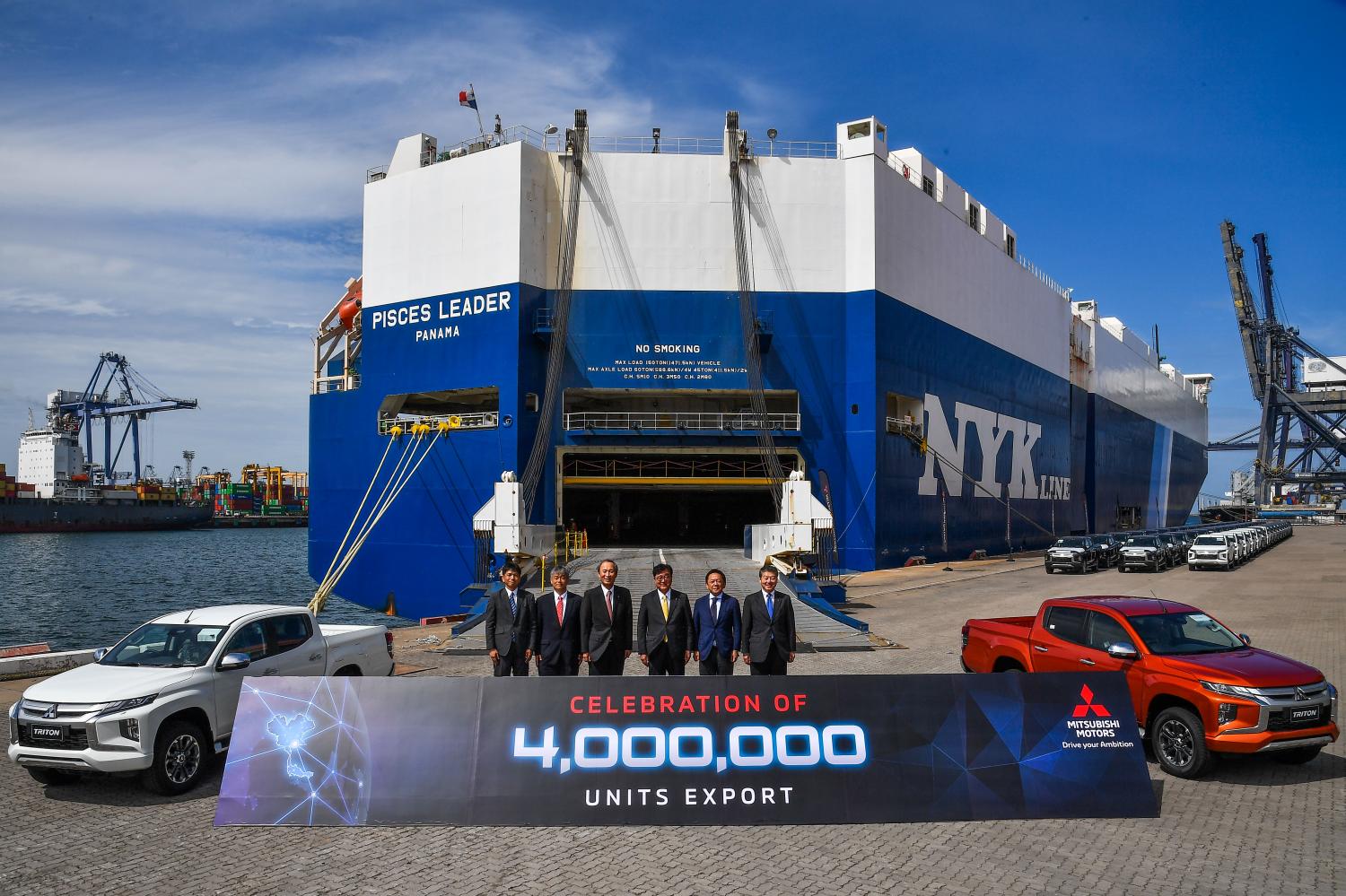 Mr Masuko (third right) presided over Mitsubishi's 4 millionth vehicle shipped from Laem Chabang port in Chon Buri.