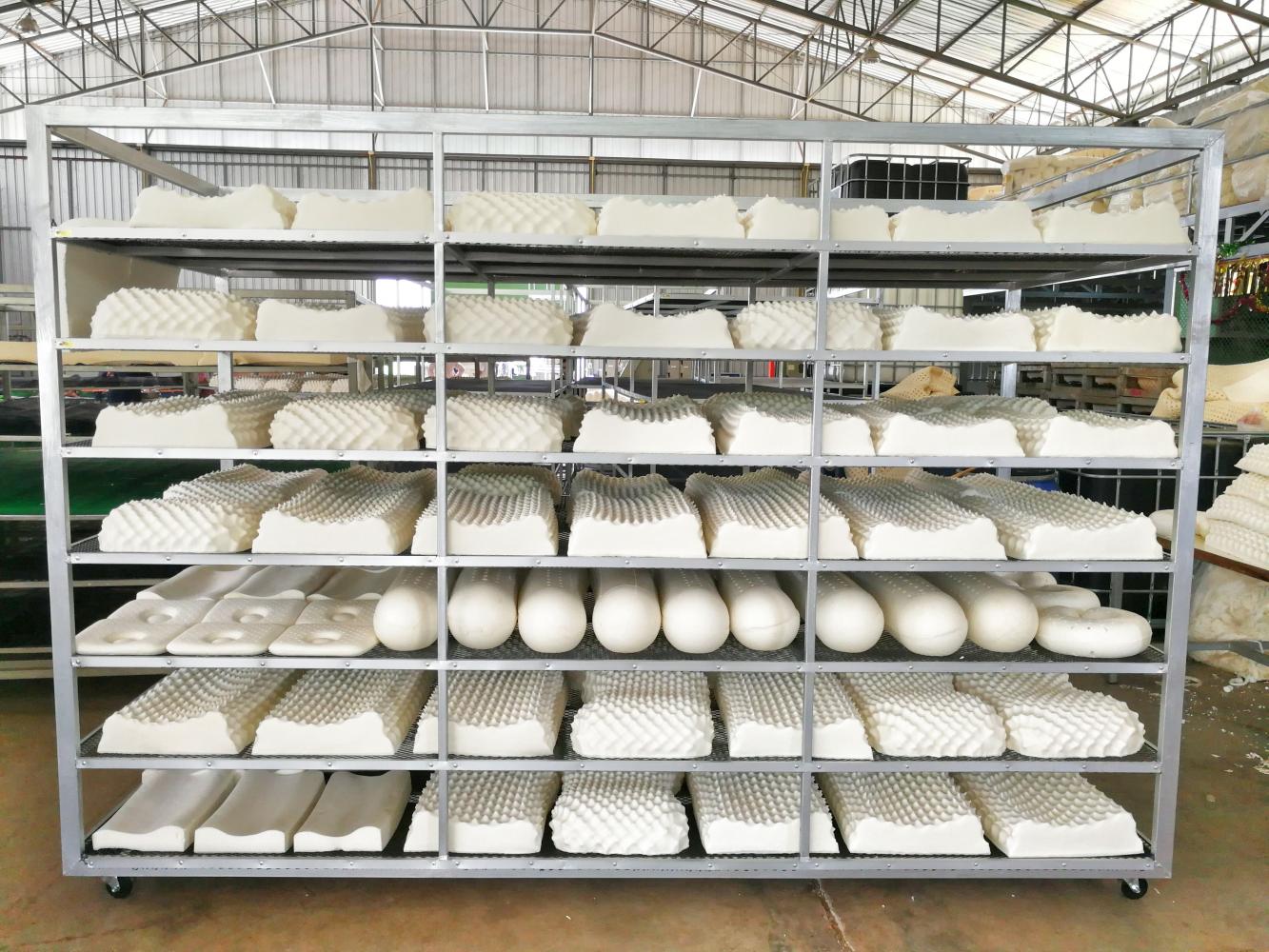 Pillows are left to dry after being removed from the oven. The National Science Technology Development Agency