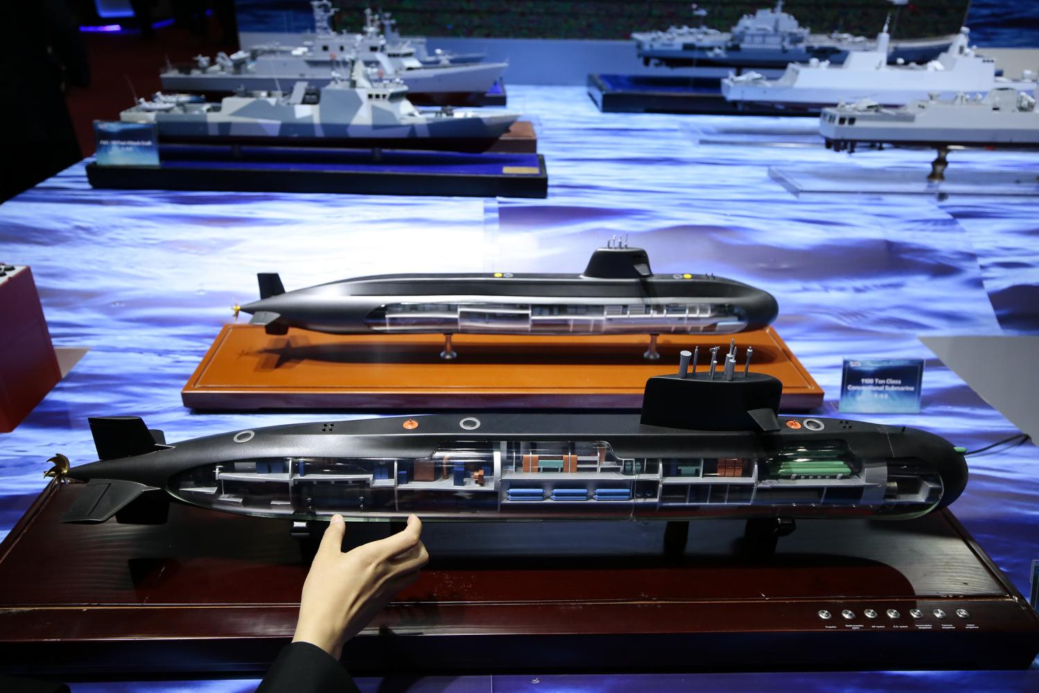 Models of Chinese subs at a defence exhibition held in Nonthaburi on Monday. (Photo by Patipat Janthong)