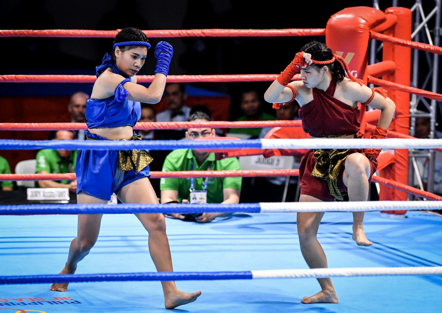 Thanawan Thongduang (right) and Ruchira Wongsriwo perform during the final of the waikru mai muaythai competition.