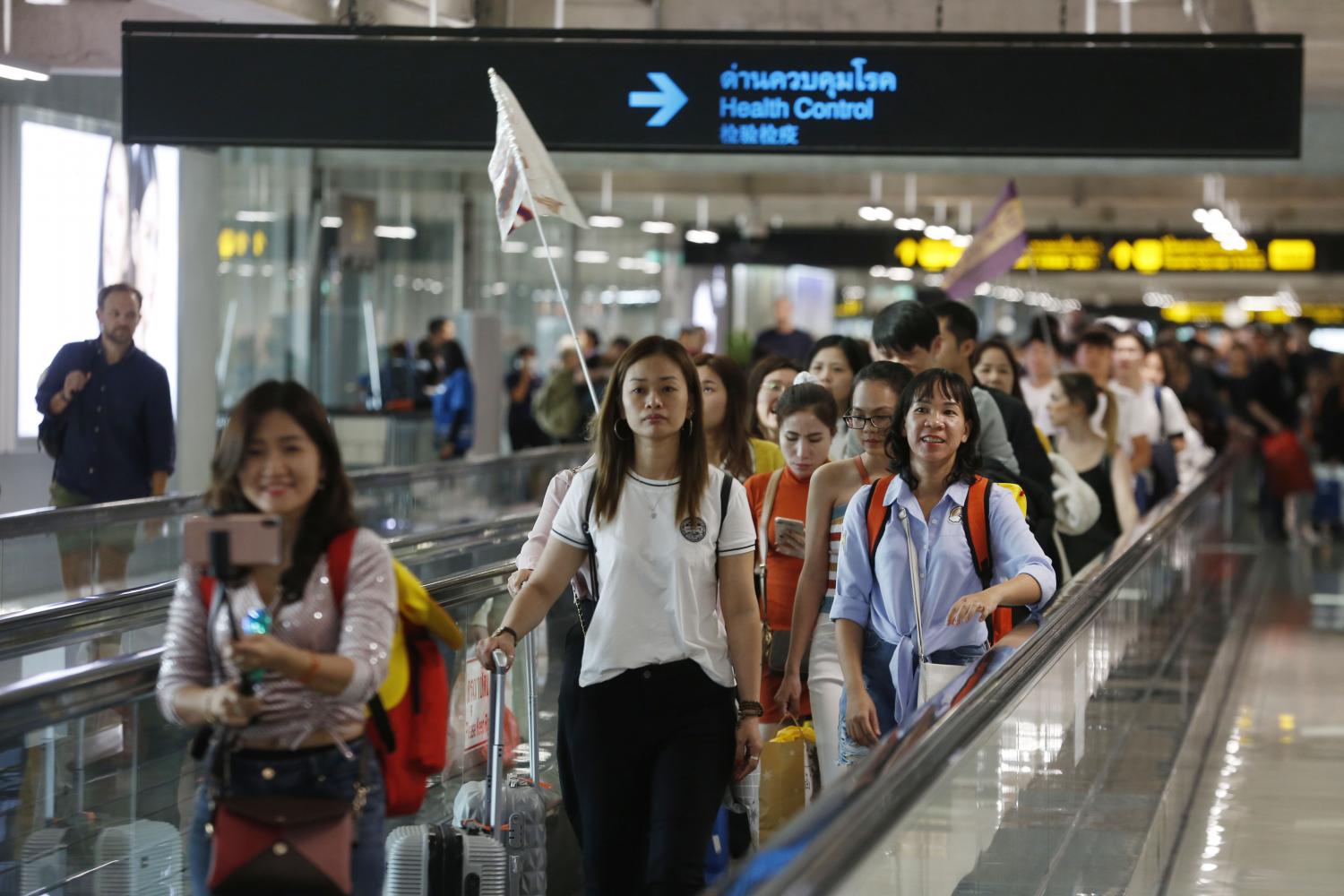 Suvarnabhumi airport is adopting stricter health measures to monitor travellers arriving from China where a mysterious viral pneumonia has broken out. (Photo by Pornprom Satrabhaya)