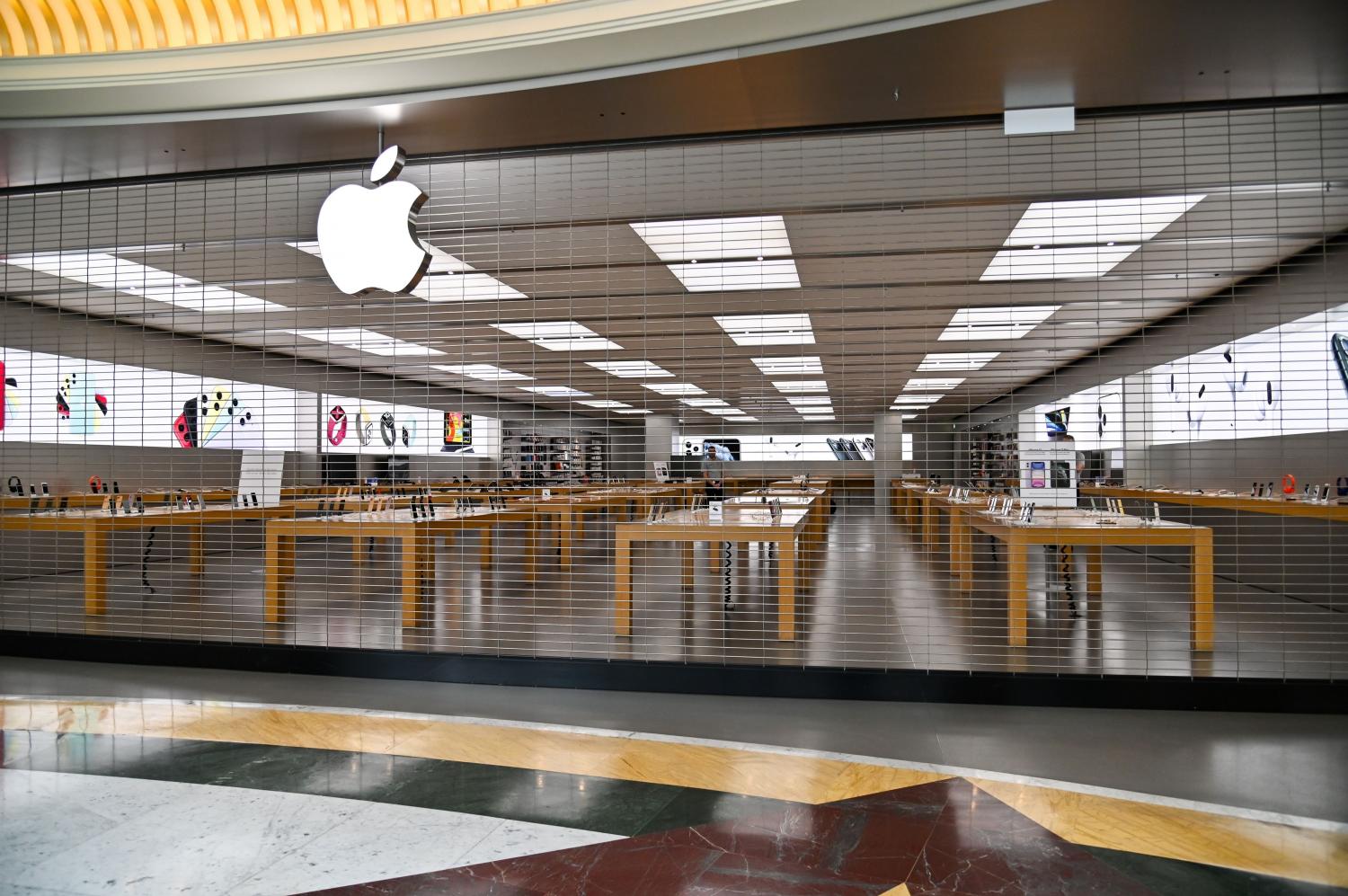 A closed Apple Store is pictured in a deserted shopping mall in Rome. AFP