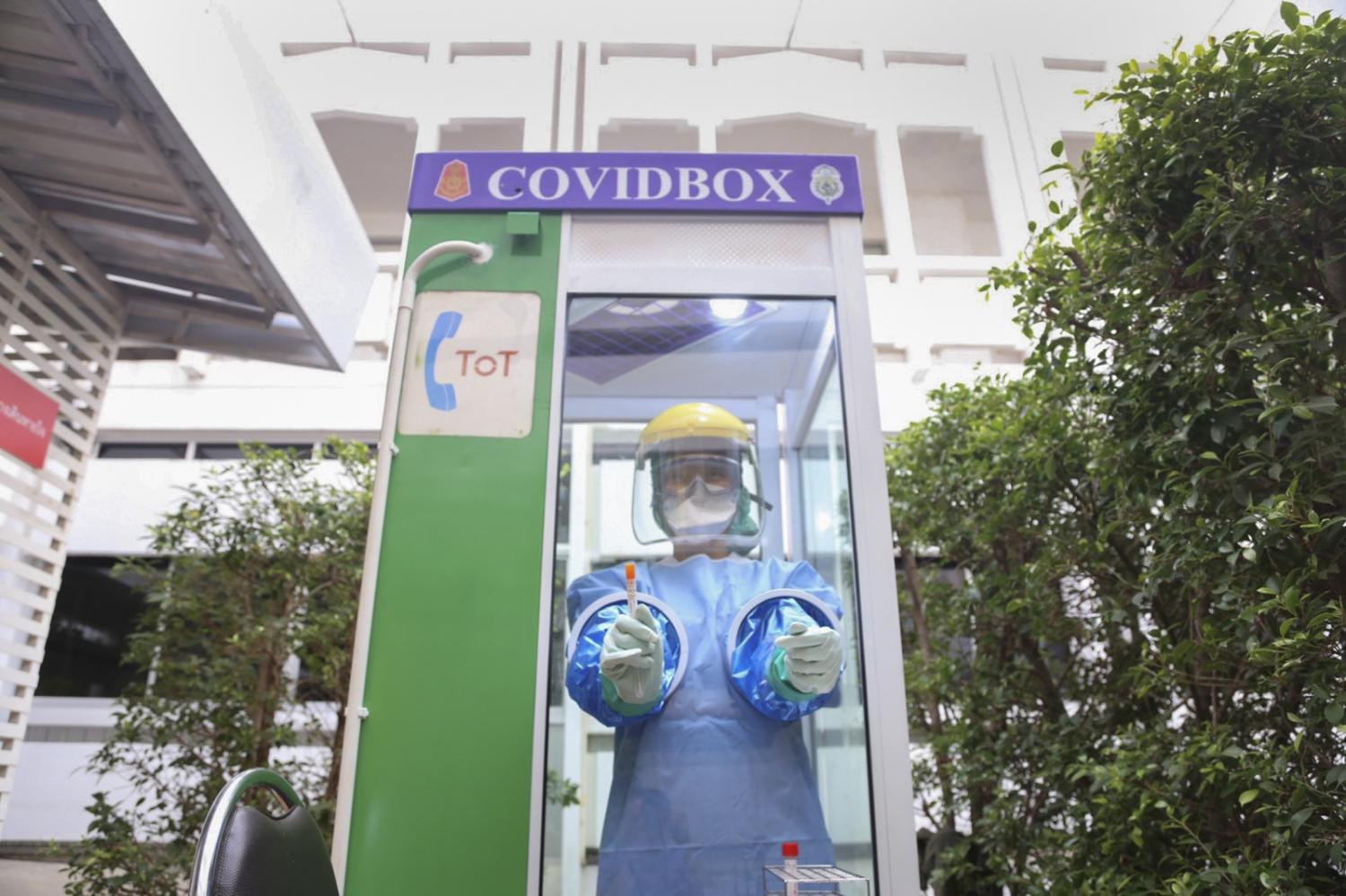 A TOT phone booth transformed into a makeshift Covid box for testing. The kiosk wards off the infection risk among healthcare workers.