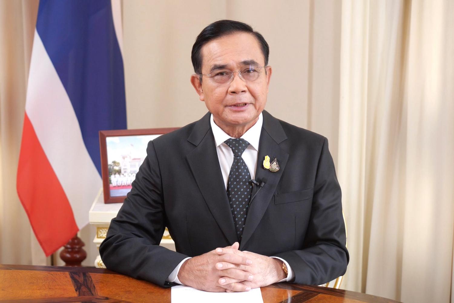 Prime Minister Prayut Chan-o-cha on Wednesday addresses in nationwide broadcast, announcing New Normal ways of working for himself and the government in the post Covid-19 era. (TV Pool photo)