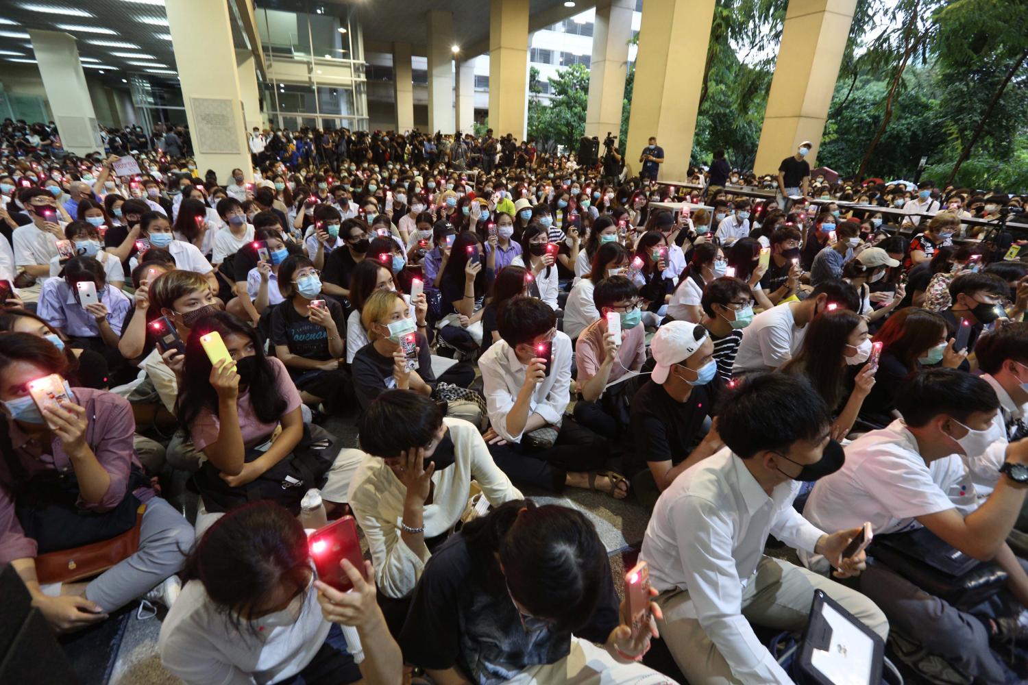 Chulalongkorn University students go ahead with their anti-government rally on campus yesterday, despite the institution prohibiting the use of its premises for political activities. (Photo by Pattarapong Chatpattarasill)