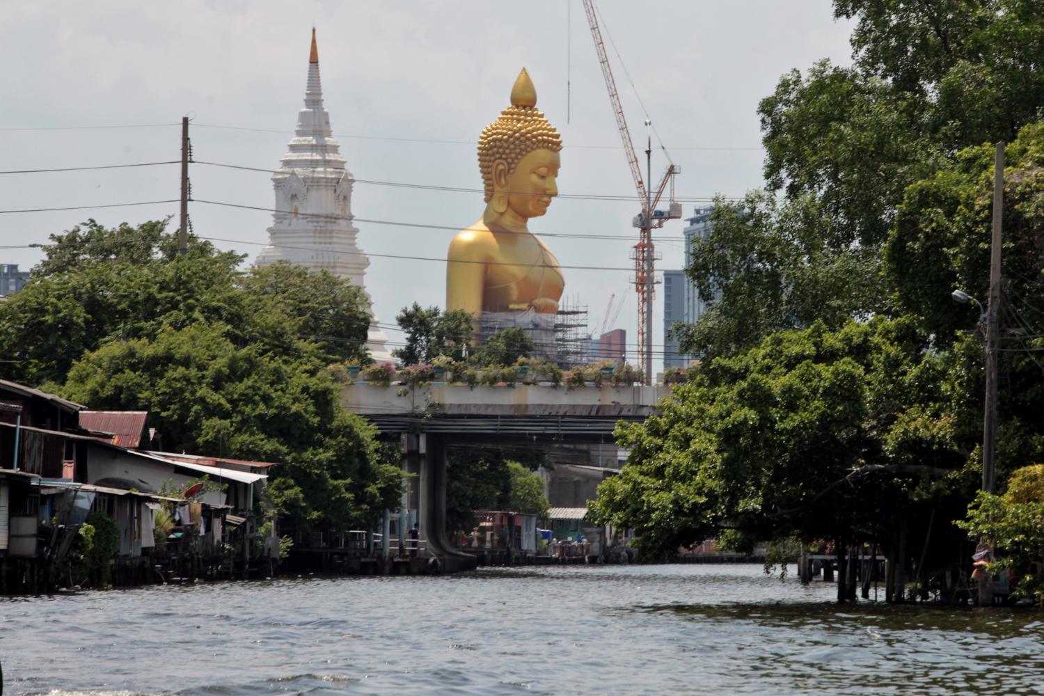 As high as the eye can see: A Buddha statue 69 metres high and 40 metres wide, equivalent to a 20-storey building, located at Wat Pak Nam near the Bangkok Yai Canal in Thon Buri. The canal is also part of a 15 kilometre water route, a new tourism destination City Hall is developing to revive local tourism.
