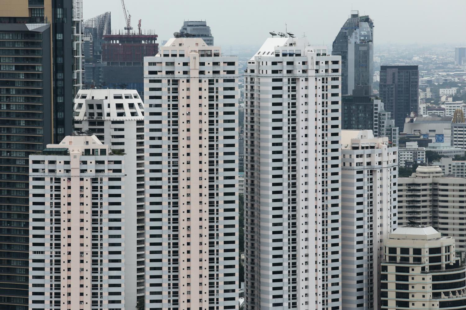 High-rise condominiums along Sukhumvit Road near the Asok intersection in Bangkok are popular with foreign buyers. Patipat Janthong High-rise condominiums along Sukhumvit Road near the Asok intersection in Bangkok are popular with foreign buyers. Patipat Janthong