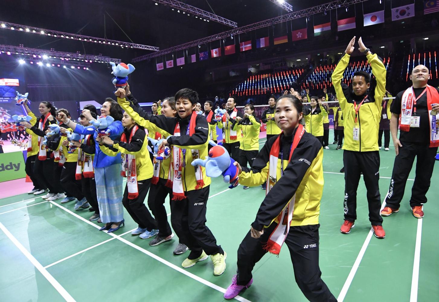 Thai players celebrate finishing second in the Uber Cup.