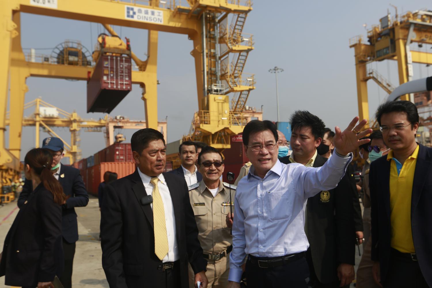 Mr Jurin gestures during his visit to Bangkok Port in Klong Toey. The government has vowed to subsidise part of the import fees for empty and used containers as part of its efforts to alleviate the container shortage. Arnun Chonmahatrakool