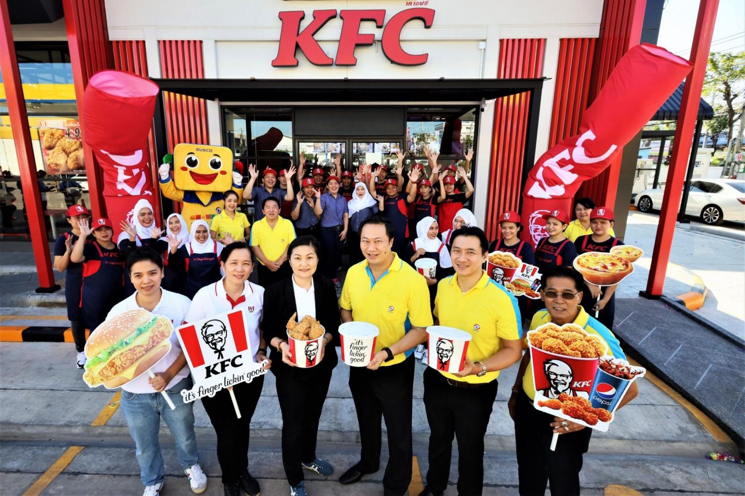 Mr Chairit, centre, says Susco plans to add four KFC outlets at its petrol stations this year. Mr Chairit, centre, says Susco plans to add four KFC outlets at its petrol stations this year.