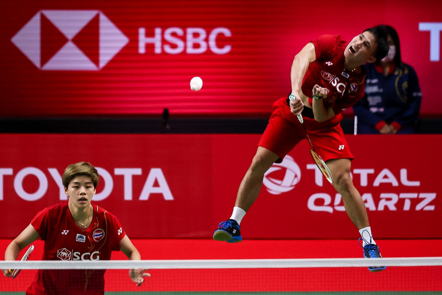 Mixed doubles pair Dechapol Puavaranukroh, right, and Sapsiree Taerattanachai play in the quarter-finals of the Toyota Thailand Open yesterday. Mixed doubles pair Dechapol Puavaranukroh, right, and Sapsiree Taerattanachai play in the quarter-finals of the Toyota Thailand Open yesterday.
