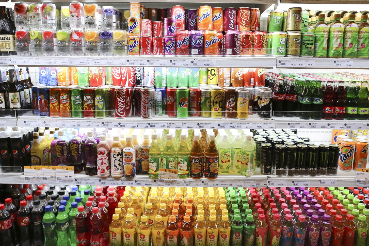 Beverages on display at a convenience store. The first phase of Thailand's excise tax on sugary drinks came into force on Sept 16, 2017.