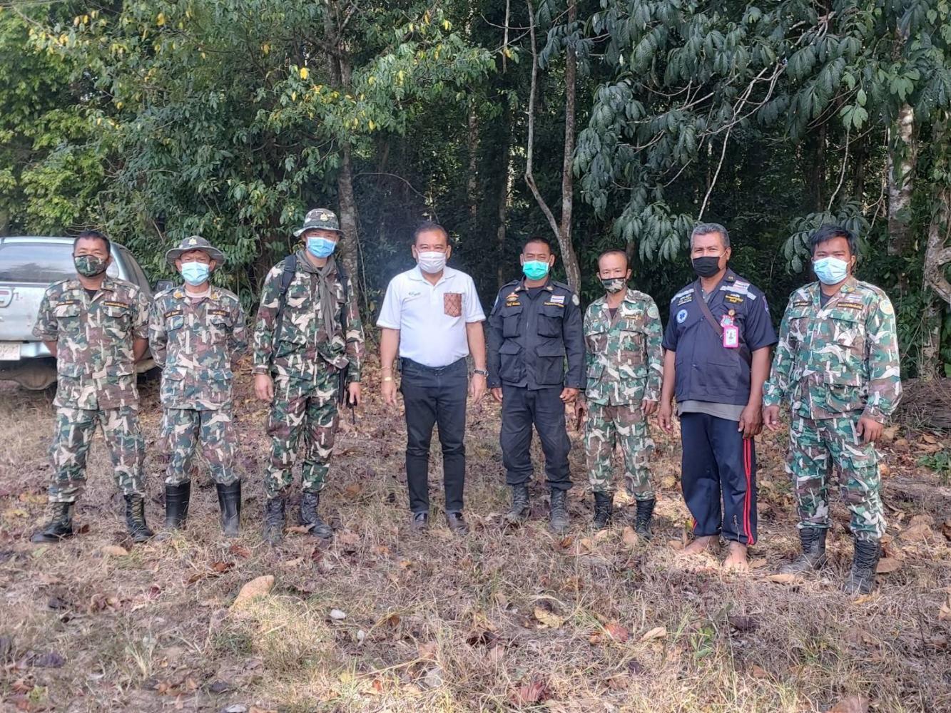 Jaruk Srion, Chanthaburi MP from the Thai Local Power Party, is flanked by officers from the Khao Ang Rue Nai Wildlife Sanctuary after he sought their advice and help to stop wild elephants foraging for food at villagers' plantations. Jaruk Srion