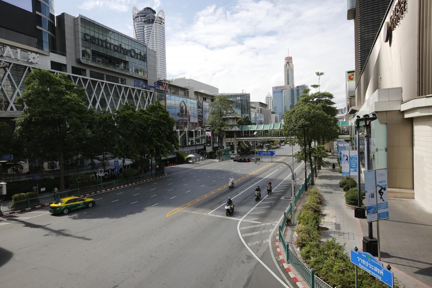 Ratchaprasong intersection in central Bangkok is void of traffic during the lockdown imposed to curb the spread of Covid-19.  Wichan Charoenkiatpakul