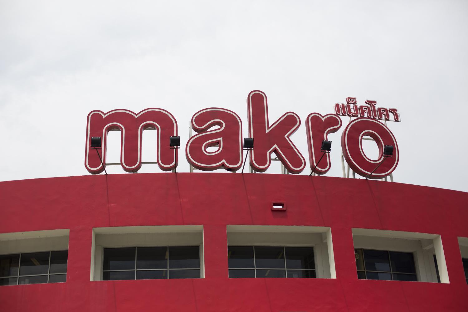 Signage is displayed atop one of CP Group's Makro stores in Bangkok. (Photo: Bloomberg)