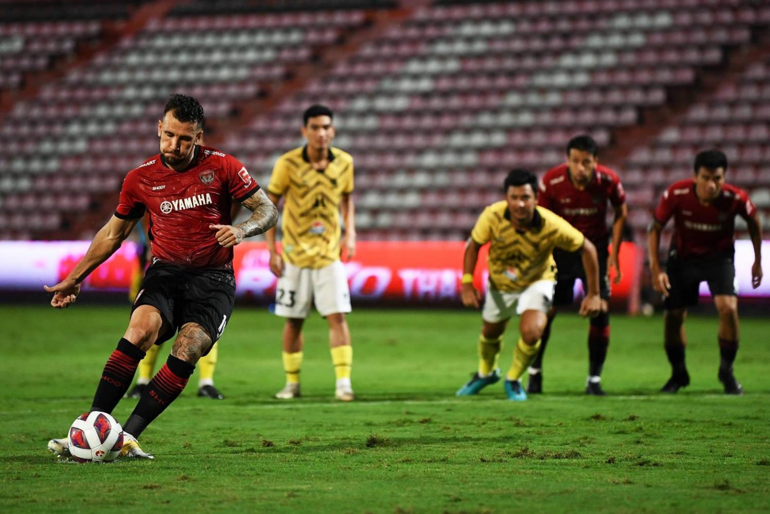 Muang Thong's Willian Popp scores against Ratchaburi from the penalty spot.