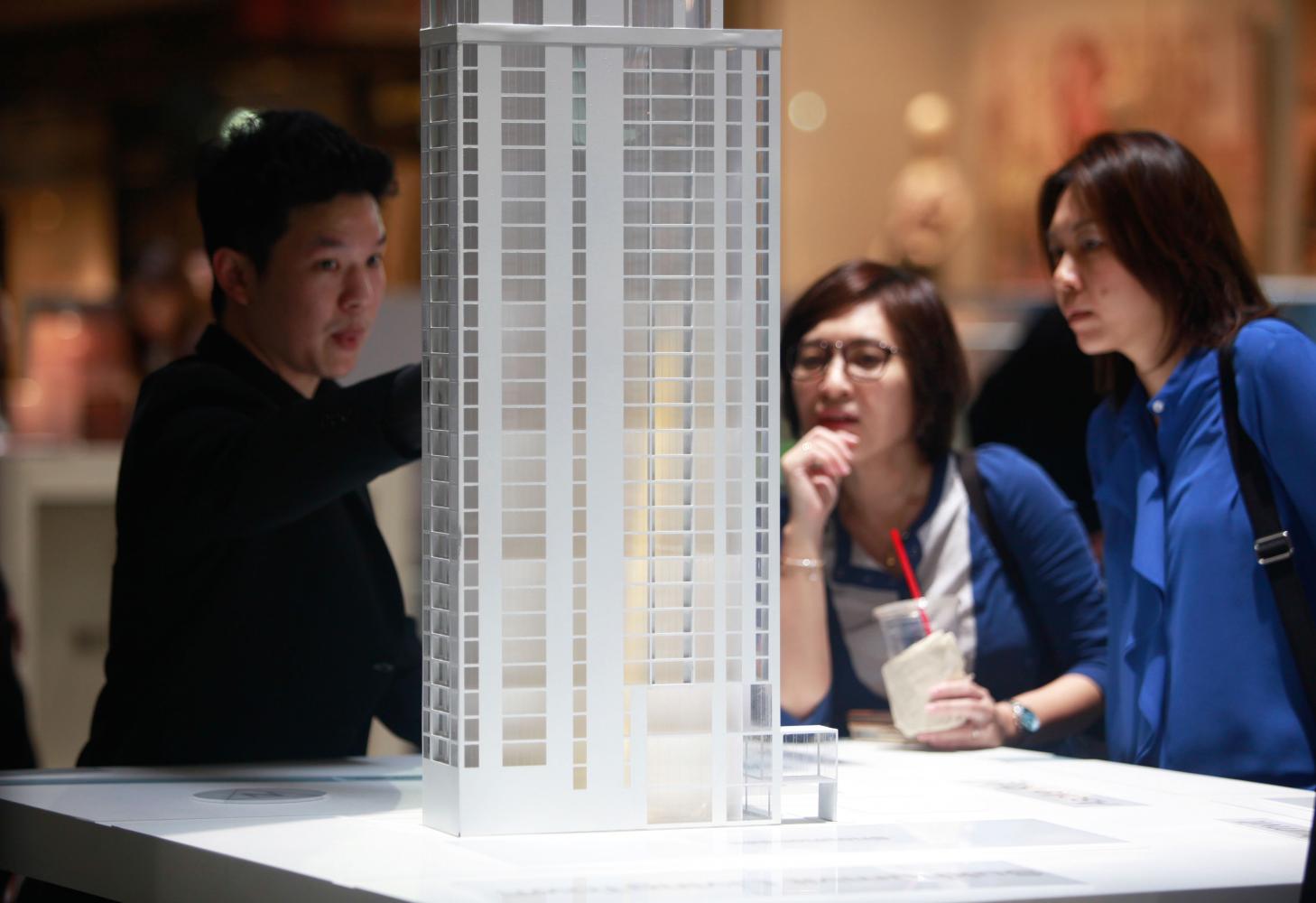 Property analysts urge caution in scheme to lure wealthy foreigners