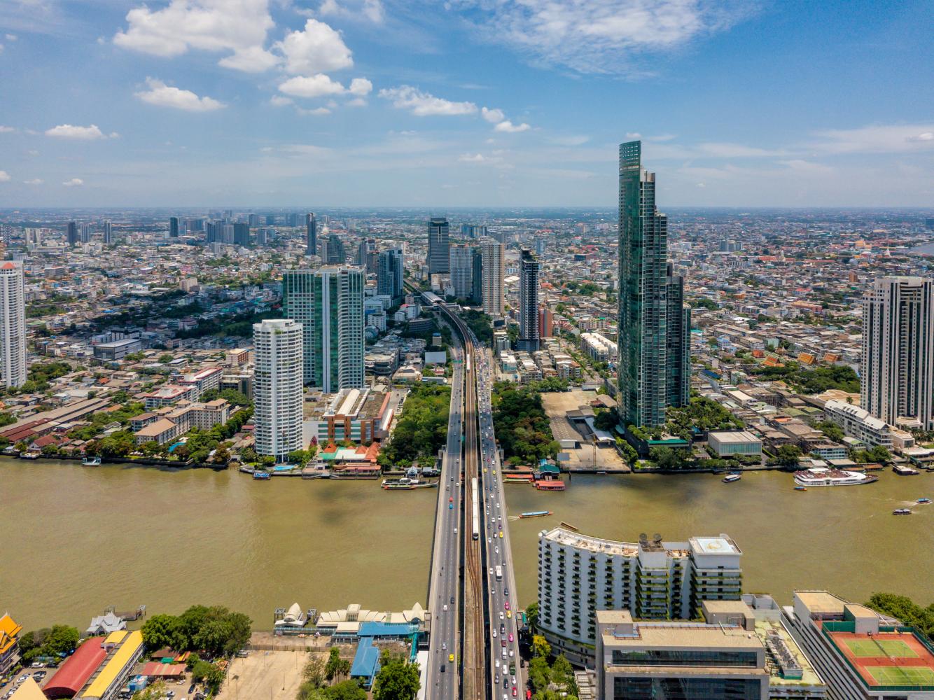 The Bangkok skyline as seen from above Saphan Taksin skytrain station.