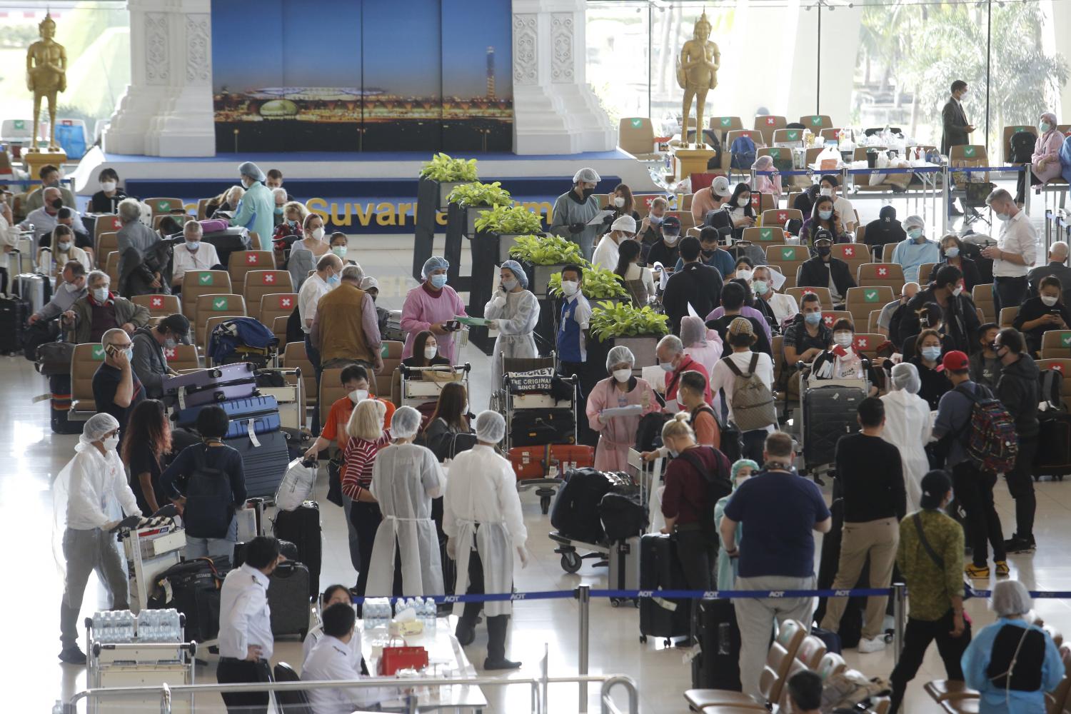 The first group of foreign visitors arrives at Suvarnabhumi airport where they went through health and documentary checks on Monday, officially marking Thailand's reopening to vaccinated tourists. The first to arrive on Monday morning at the airport was an All Nippon Airways flight from Tokyo. Wichan Charoenkiatpakul