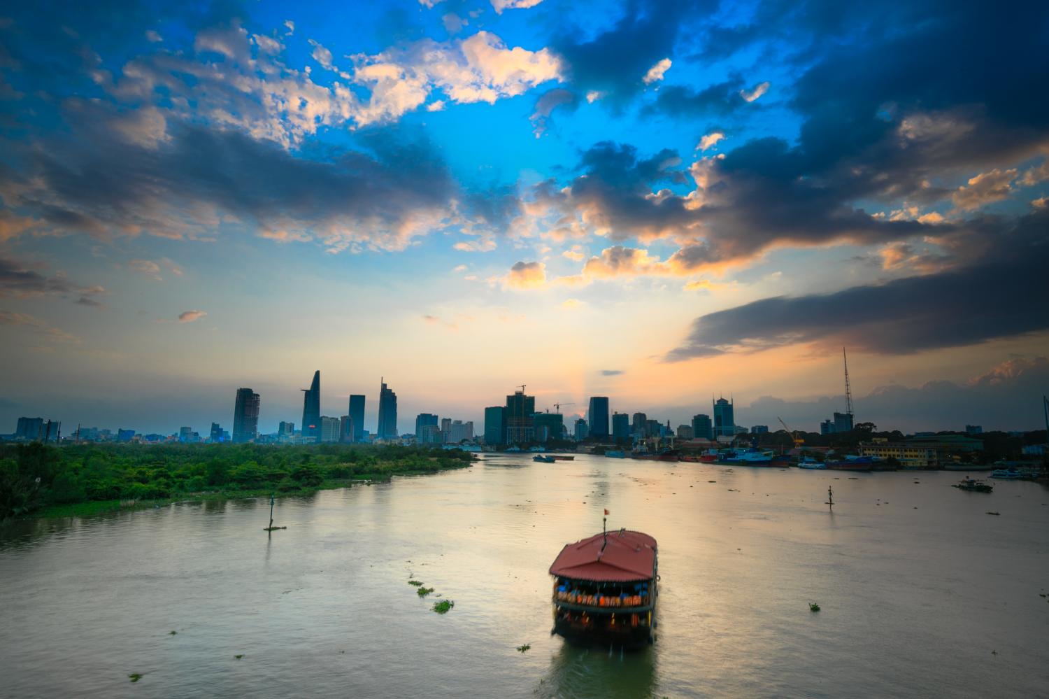 Sunset on the Saigon River in Ho Chi Minh City. Vietnam has proved to be one of the most resilient economies in Asean during the pandemic. Photo © 123RF.com