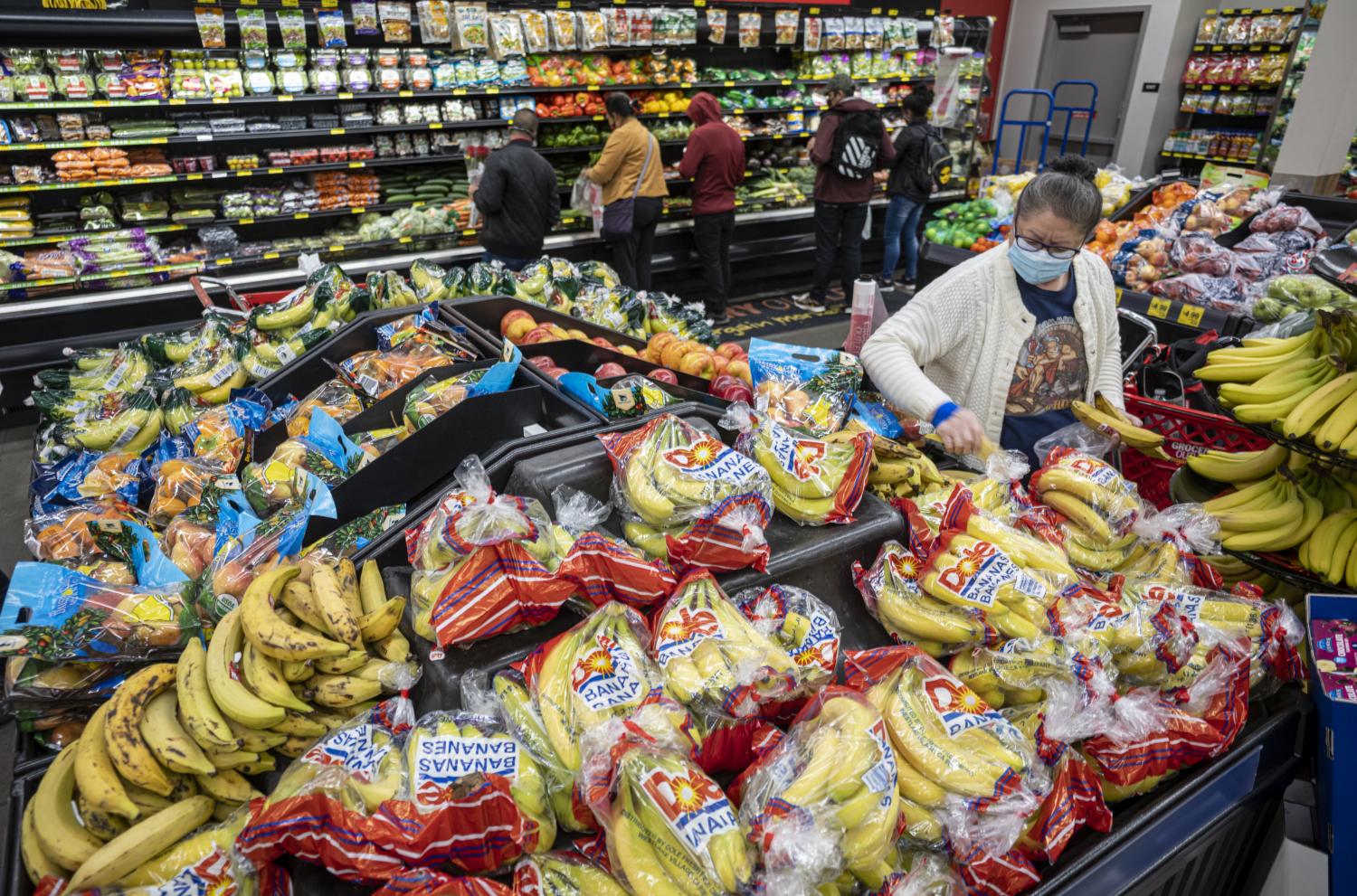 Food retailers say they are waiting for clarity around the new variant before making changes to their operations. Bloomberg Food retailers say they are waiting for clarity around the new variant before making changes to their operations. Bloomberg