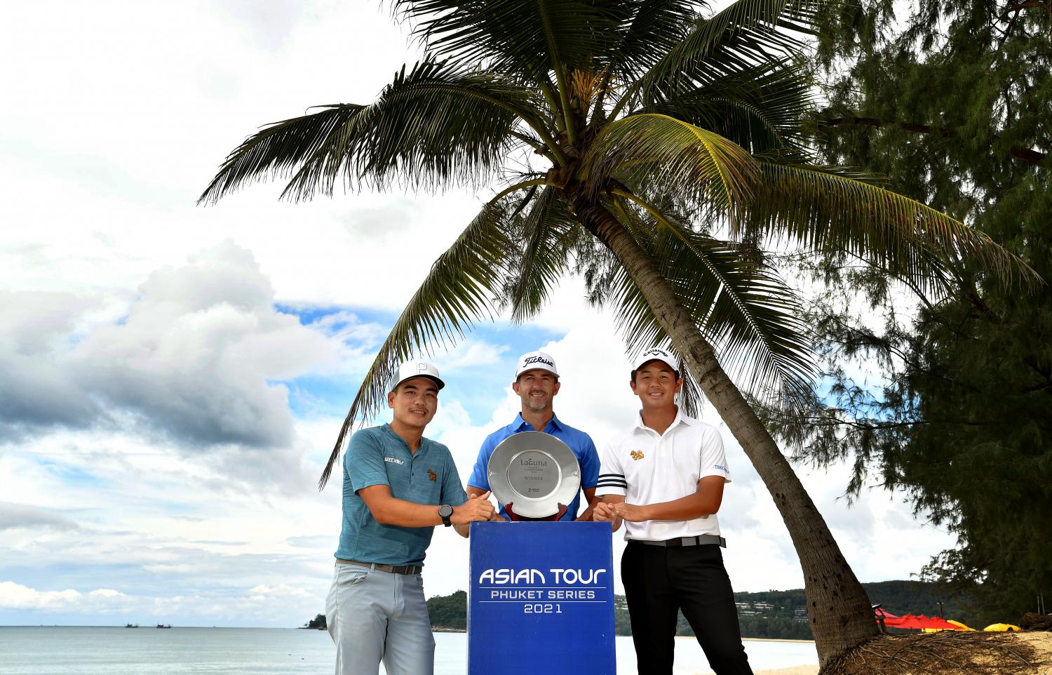 From left, Suttijet Kooratanapisan, Wade Ormsby and Ratchanon Chantananuwat pose with the Laguna Phuket Championship trophy yesterday. asian tour PR