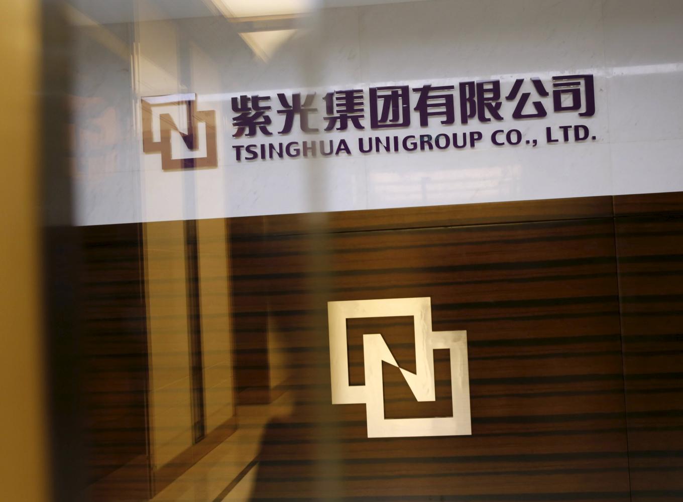In December, Tsinghua Unigroup Co., said a consortium led by two state-backed semiconductor venture-capital firms would become its strategic investor. (Photos by REUTERS) In December, Tsinghua Unigroup Co., said a consortium led by two state-backed semiconductor venture-capital firms would become its strategic investor. (Photos by REUTERS)