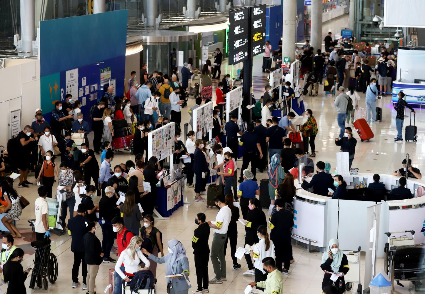 International passengers arrive at Suvarnabhumi airport on the first day of the kingdom scrapping the requirement for pre-travel RT-PCR tests for visitors arriving under the Test & Go, Sandbox and quarantine programmes. (Photo: Nutthawat Wicheanbut)