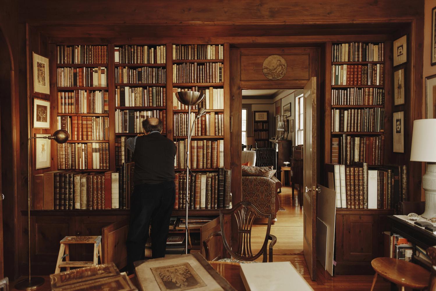 David Godine among the books at his home in Milton, Massachusetts. TONY LUONG/nyt