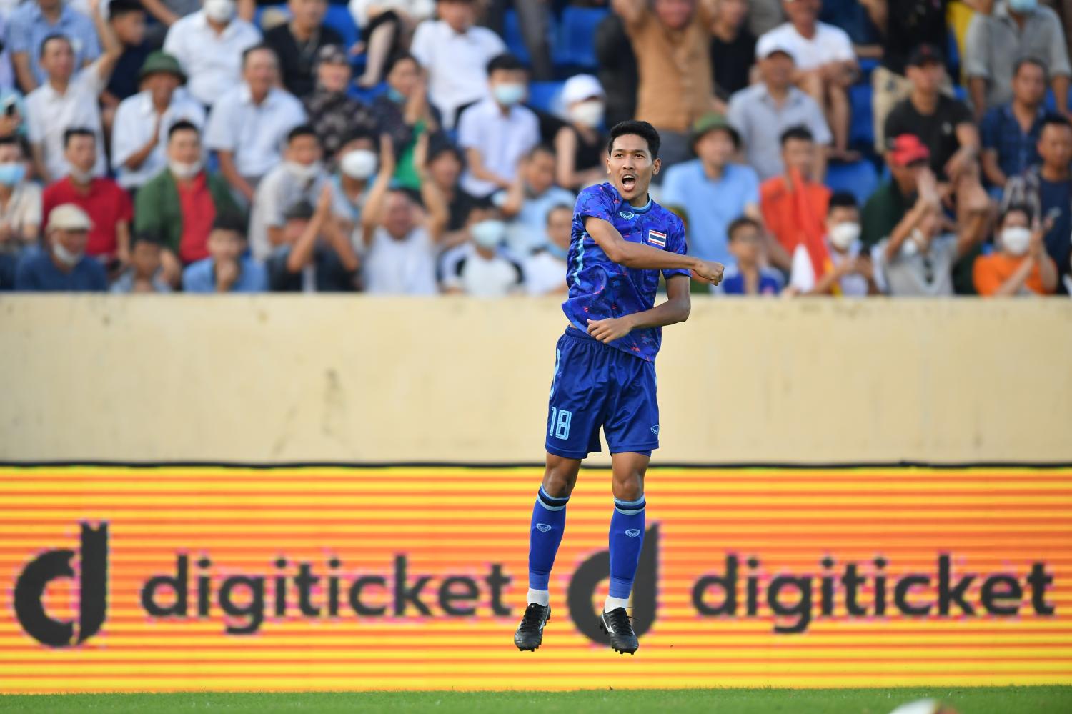 Thailand's Weerathep Pomphan reacts after scoring against Indonesia.