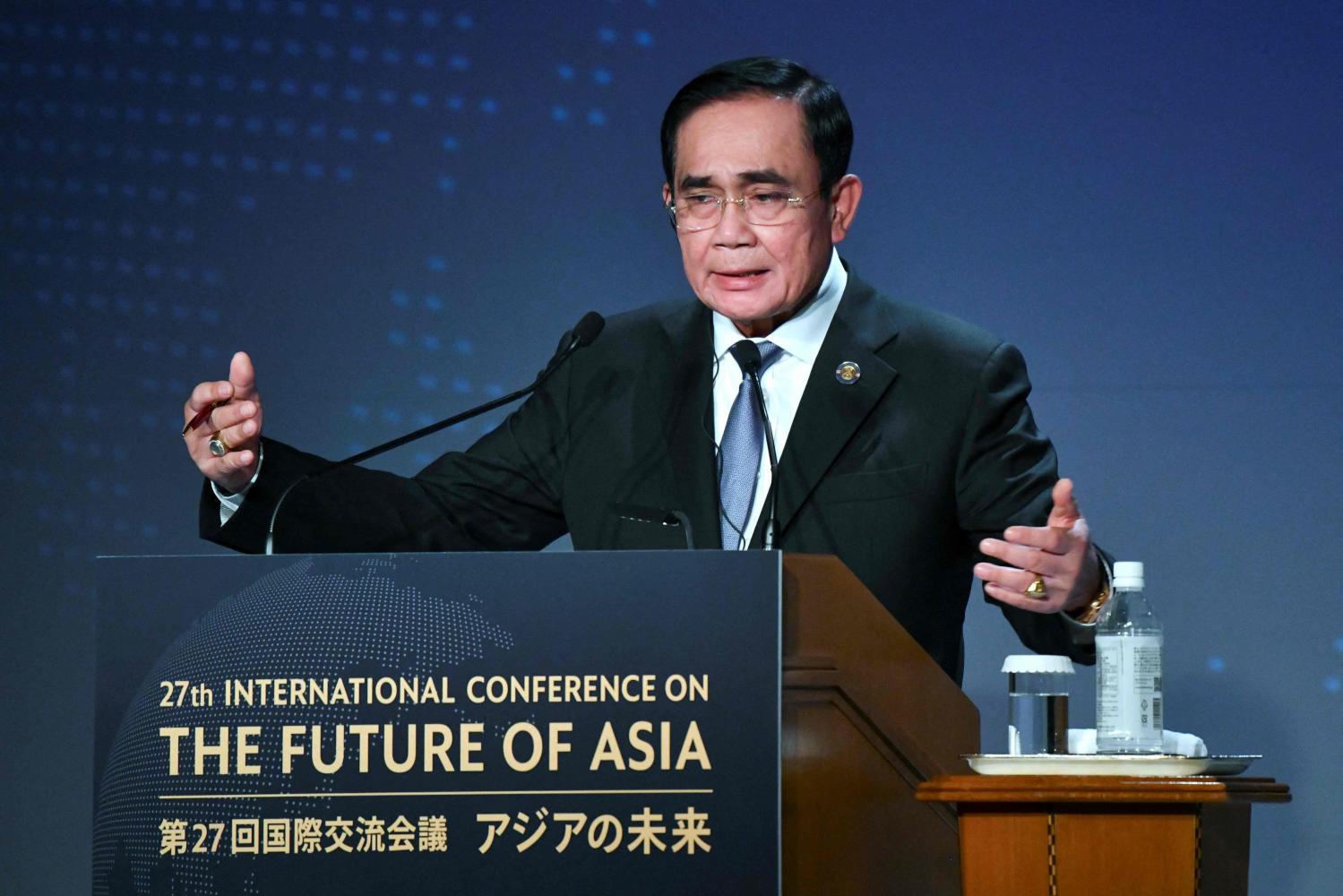 Prime Minister Prayut Chan-o-cha delivers a speech as part of the 27th International Conference on The Future of Asia in Tokyo on Thursday. (AFP photo)