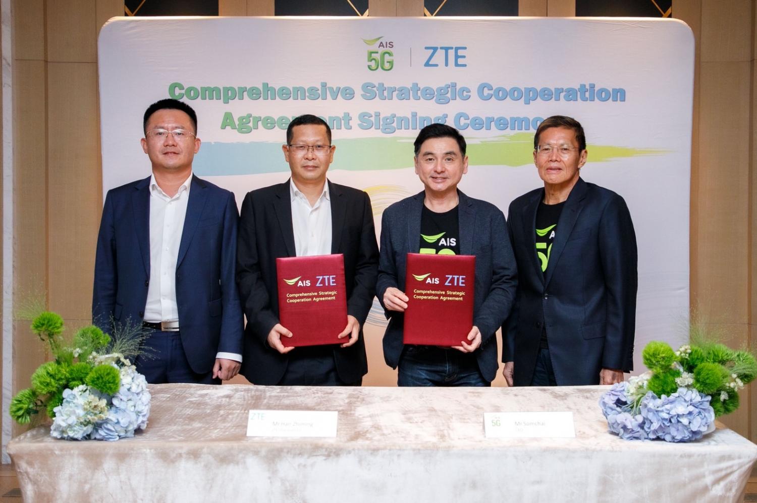 Mr Somchai, second right, at the signing ceremony for the agreement with ZTE.