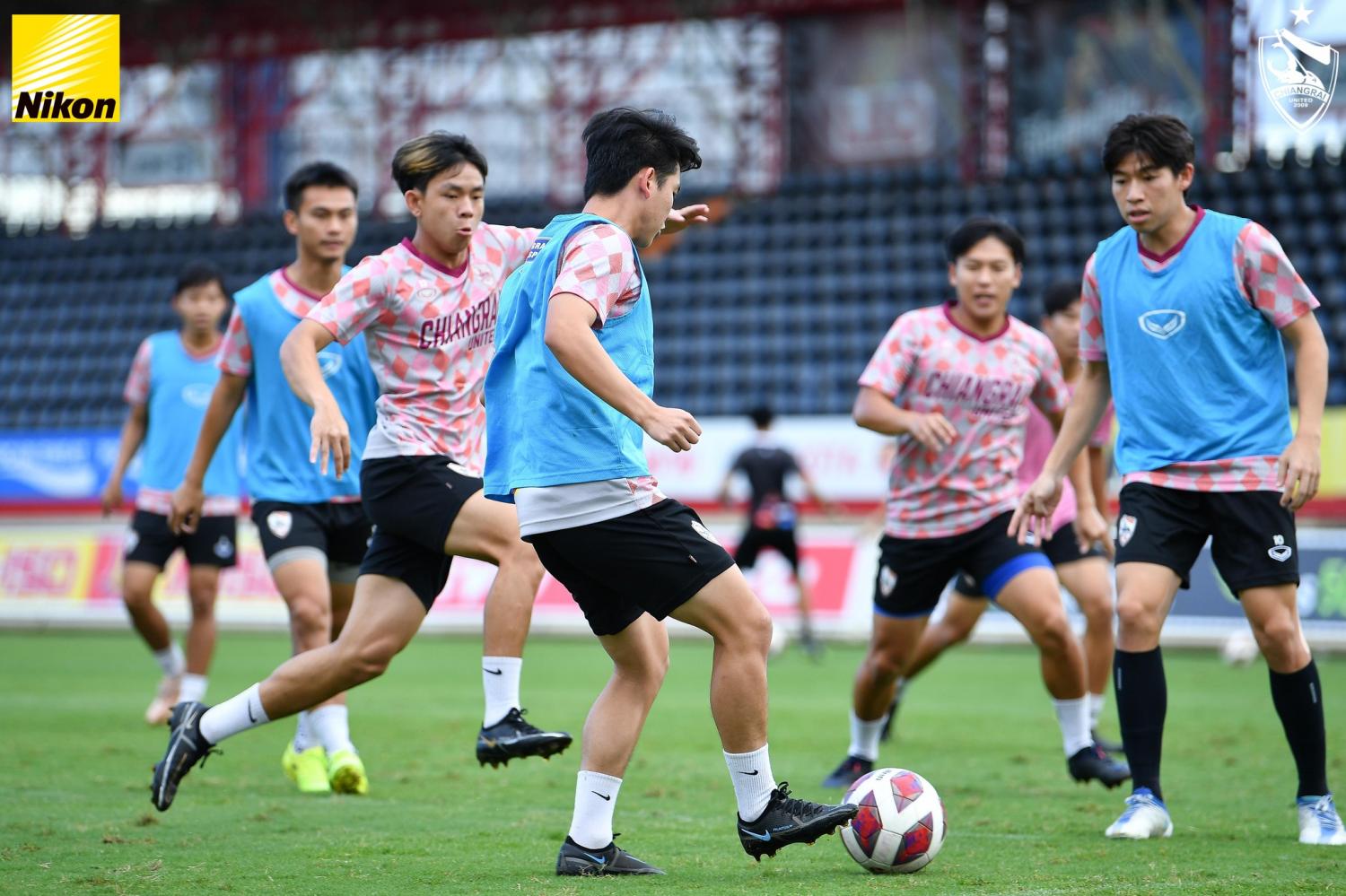 Chiang Rai United players take part in a training session.