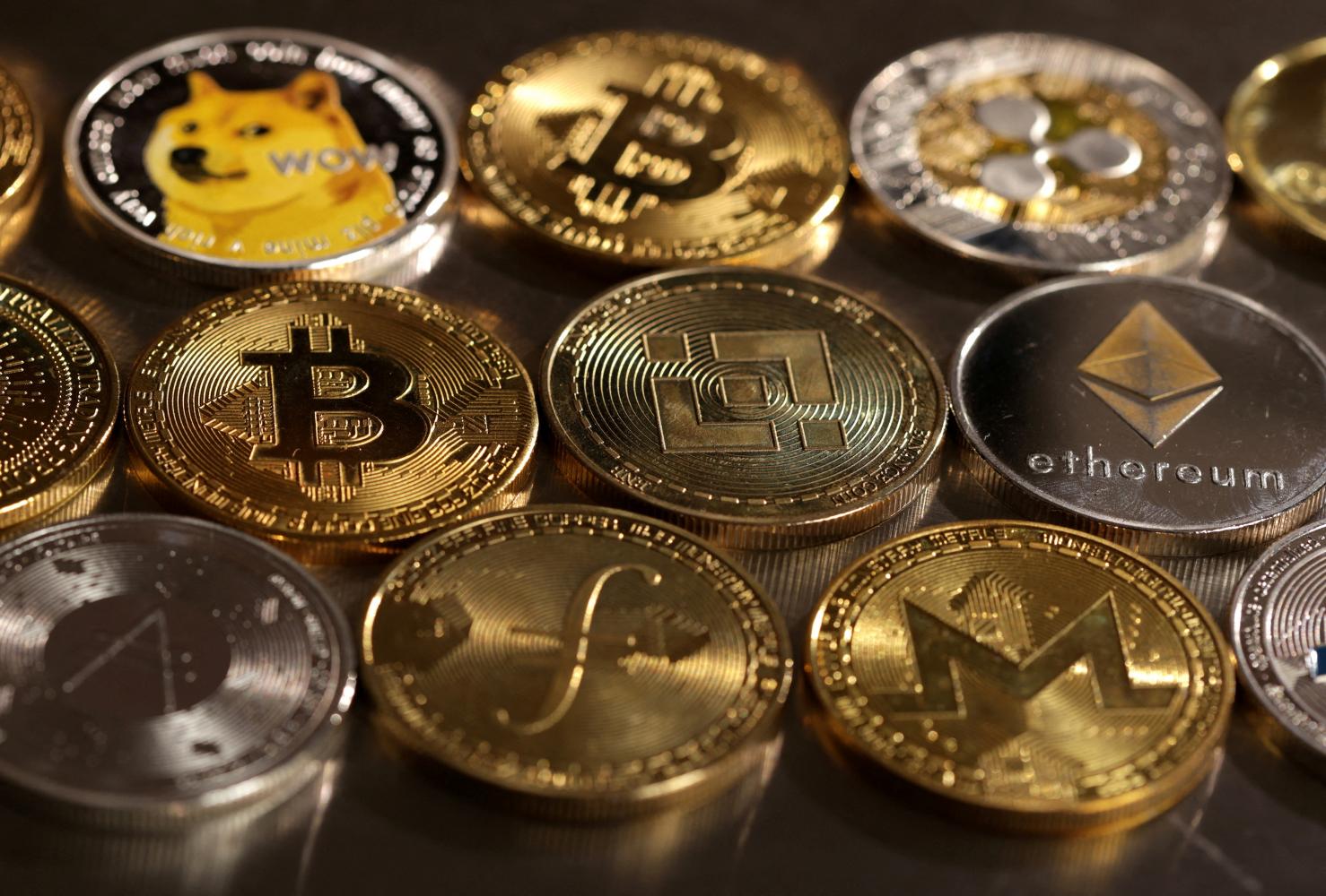 Representations of cryptocurrencies are seen in this illustration from Aug 10, 2022. (Reuters photo)