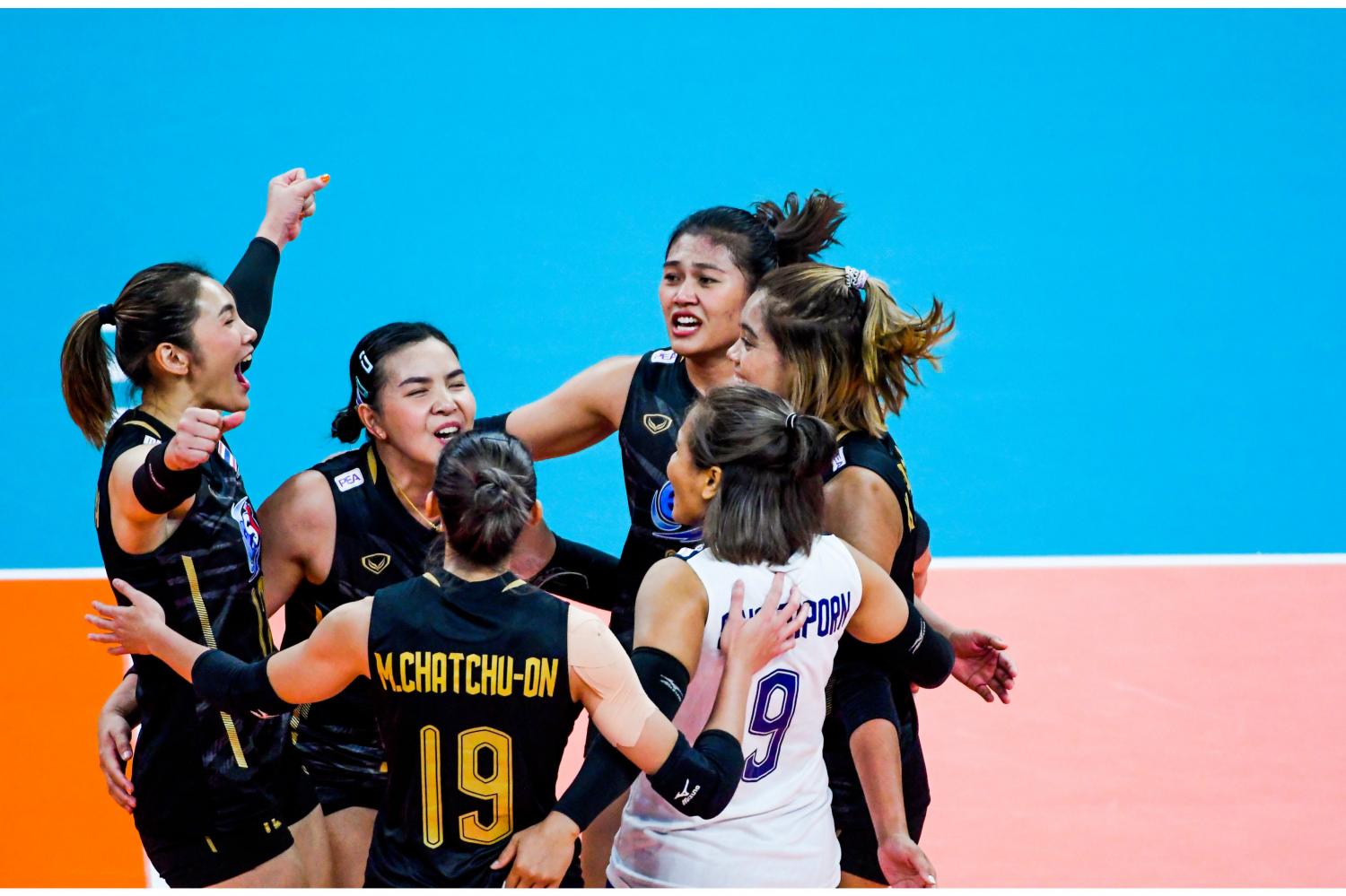 Thailand players celebrate after beating Dominican Republic at the FIVB Women's World Championship. volleyballworld.com volleyballworld.com