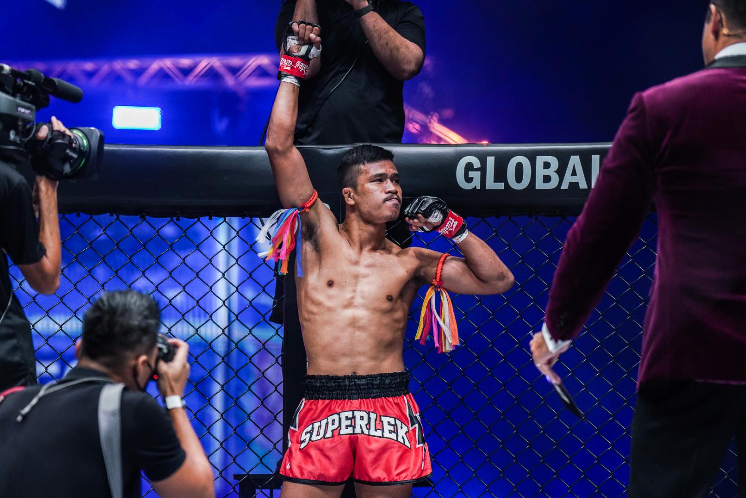 Thai fighter Superlek Kiatmoo9 poses after a recent bout.