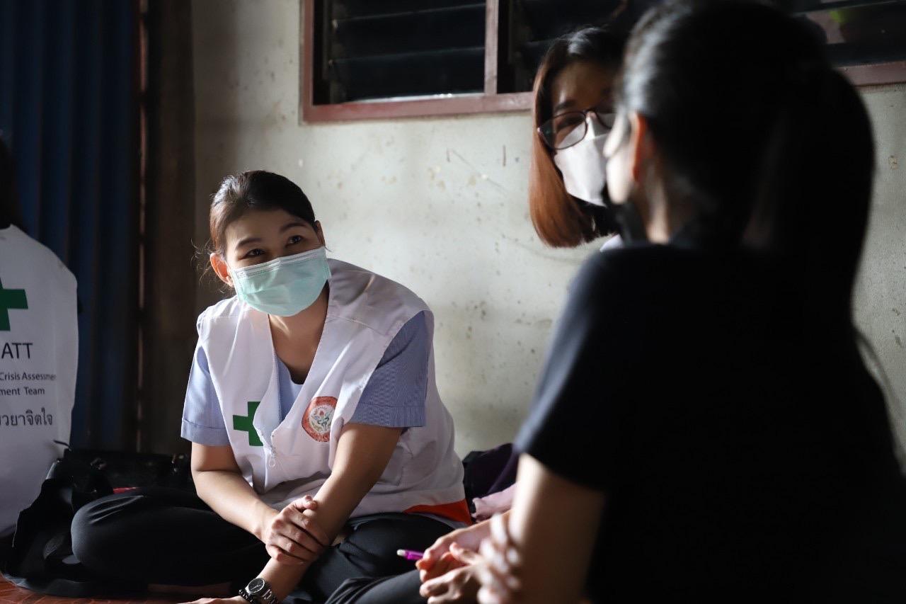 Sympathetic souls: A team of volunteer nurses visits a family to help them with their grief from the tragedy.