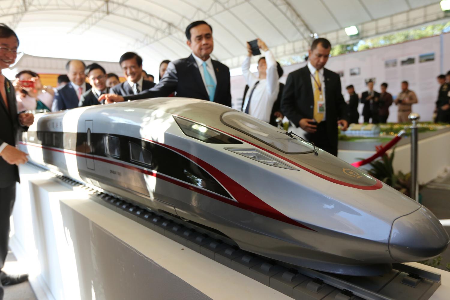 Prime Minister Prayut Chan-o-cha inspects a model of the Thai-Chinese high-speed railway expected to link Bangkok and Nakhon Ratchasima at the construction inauguration ceremony in December 2017. (Photo: Wichan Charoenkiatpakul)