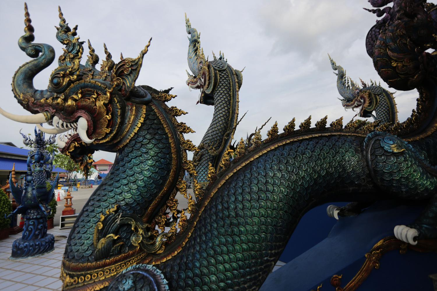 A naga adorns a staircase leading to the main chapel of Wat Rong Sua Ten in Chiang Rai. The mythical creature has been designated as one of Thailand's national symbols. Wichan Charoenkiatpakul