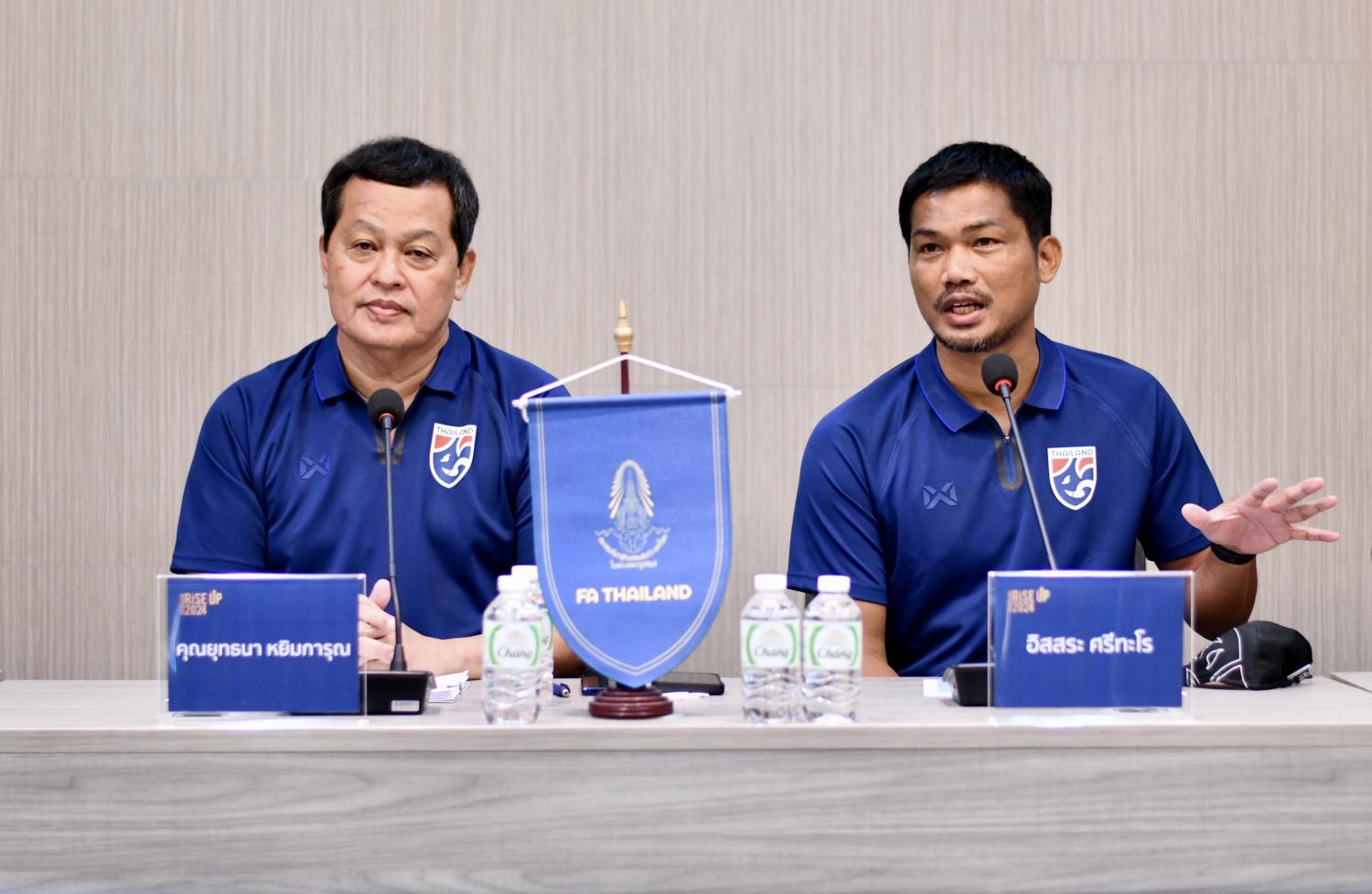 Thailand U23 manager Yuthana Yimkarun, left, and coach Issara Sritaro attend a press conference.