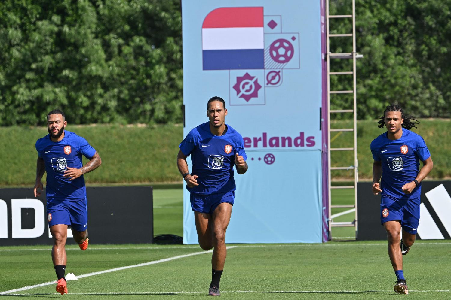 Netherlands players, from left, Memphis Depay, Virgil van Dijk and Nathan Ake take part in a training session at Qatar University training site in Doha. (AFP photo) Netherlands players, from left, Memphis Depay, Virgil van Dijk and Nathan Ake take part in a training session at Qatar University training site in Doha. (AFP photo)