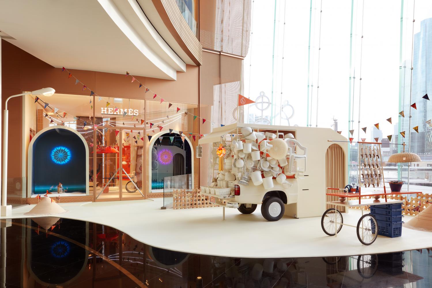 Suntur's reinterpretation of a temple fair at the duplex Hermès store in Iconsiam.