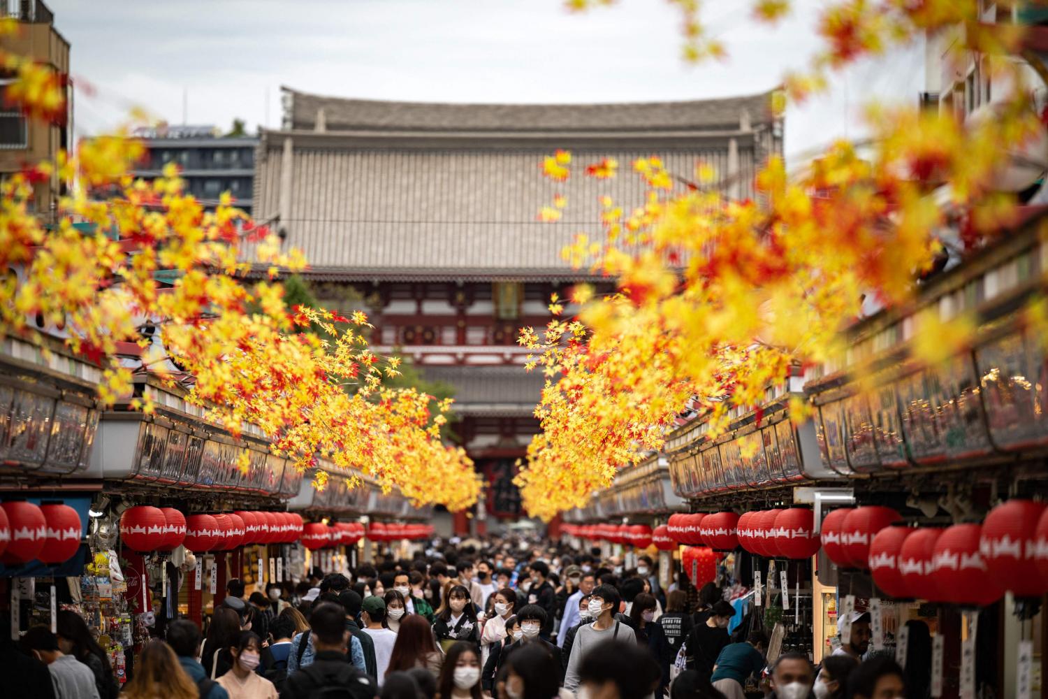 People visit Sensoji Temple, a popular tourist location, in Tokyo on Oct 12. AFP