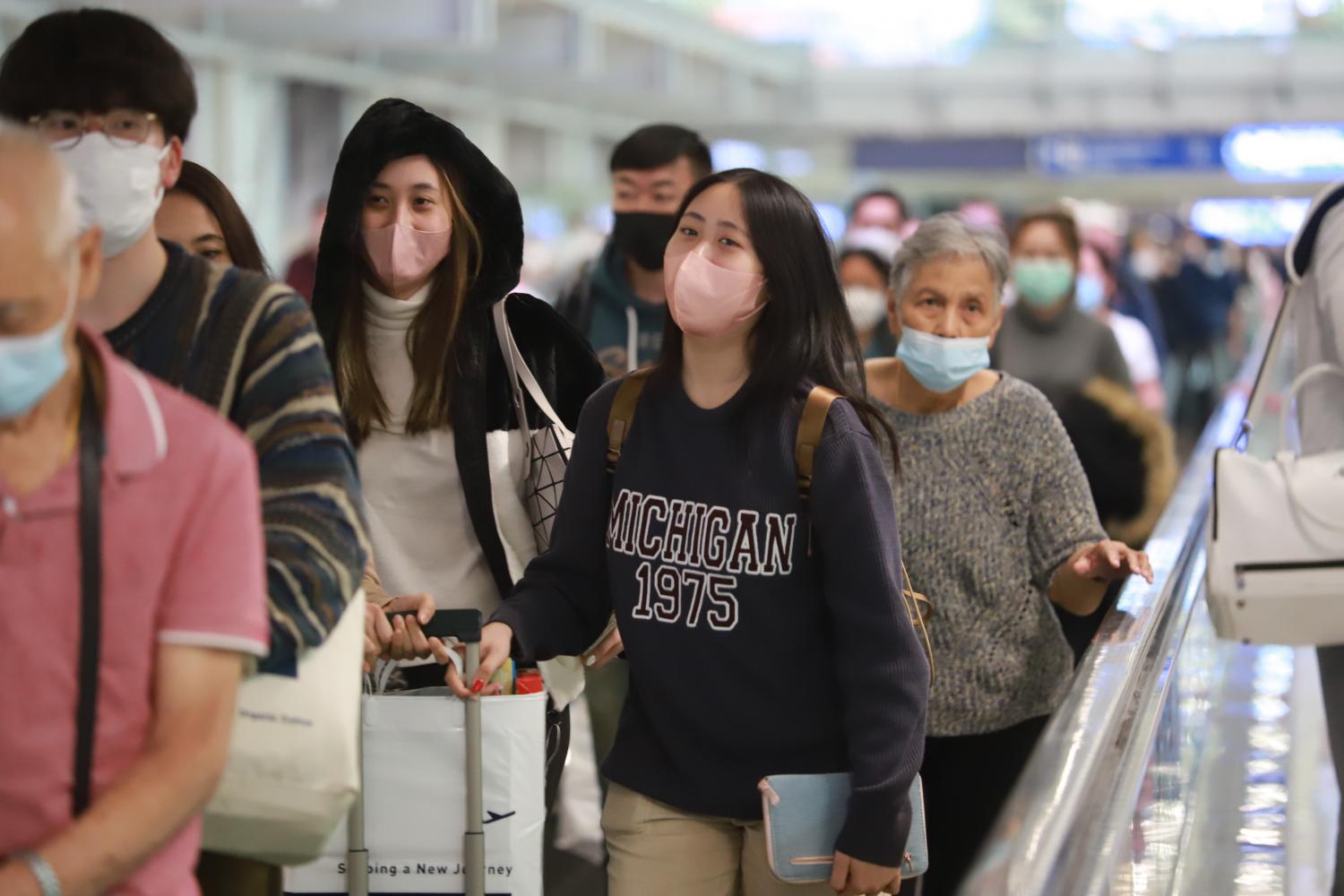 Travellers upon arrival at Suvarnabhumi airport during the first few days of 2023. (Photo: Somchai Poomlard)