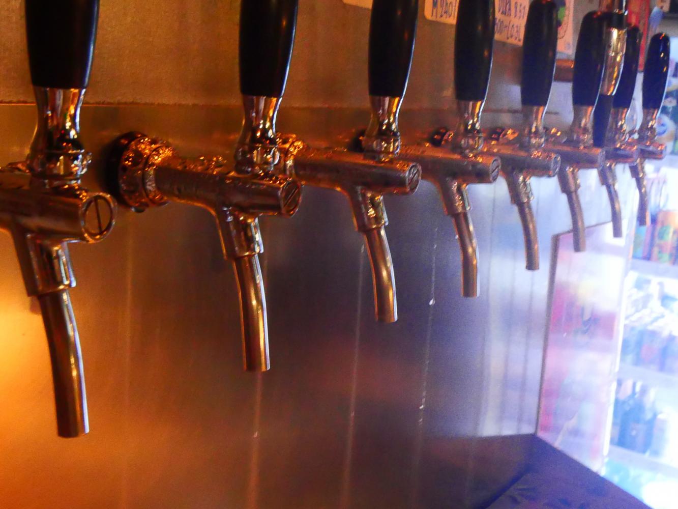 A selection of craft beer is seen on tap at a beer festival in Bangkok in October last year. Thai entrepreneurs are calling on the government to simplify the requirement for running small-scale distilleries in the country. (Photo: Surasak Glahan)