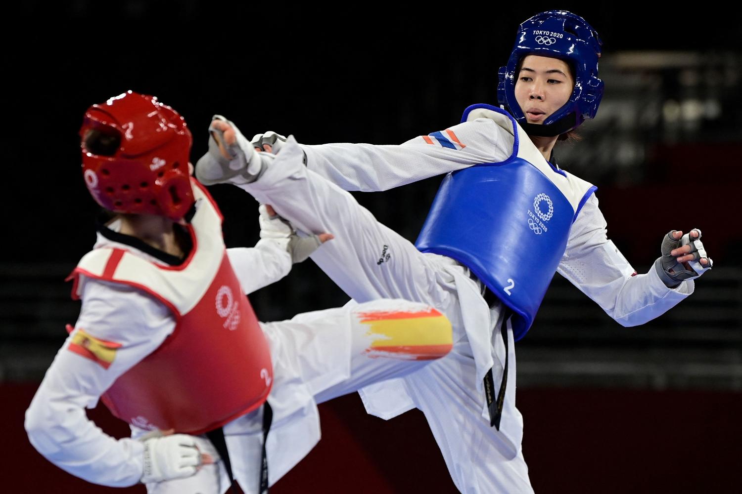 Thai taekwondo star Panipak Wongpattanakit, right, will be looking for her second Asian Games gold medal at Hangzhou. (Photo: AFP)