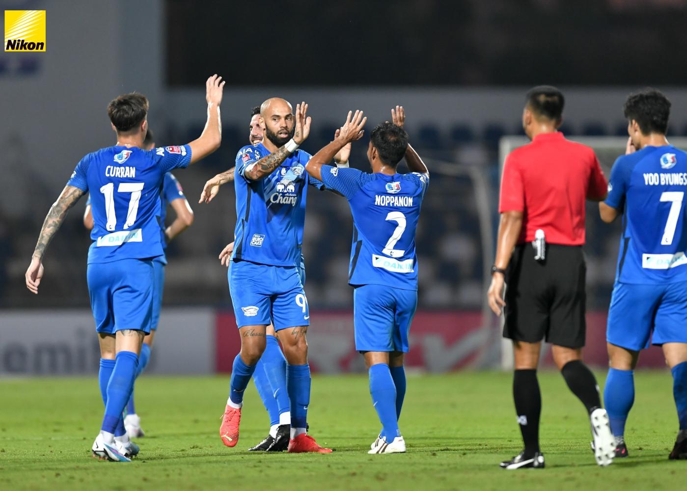 Chonburi's Danilo Alves, centre, celebrates with teammates after scoring against Police Tero in Thai League 1 last week.