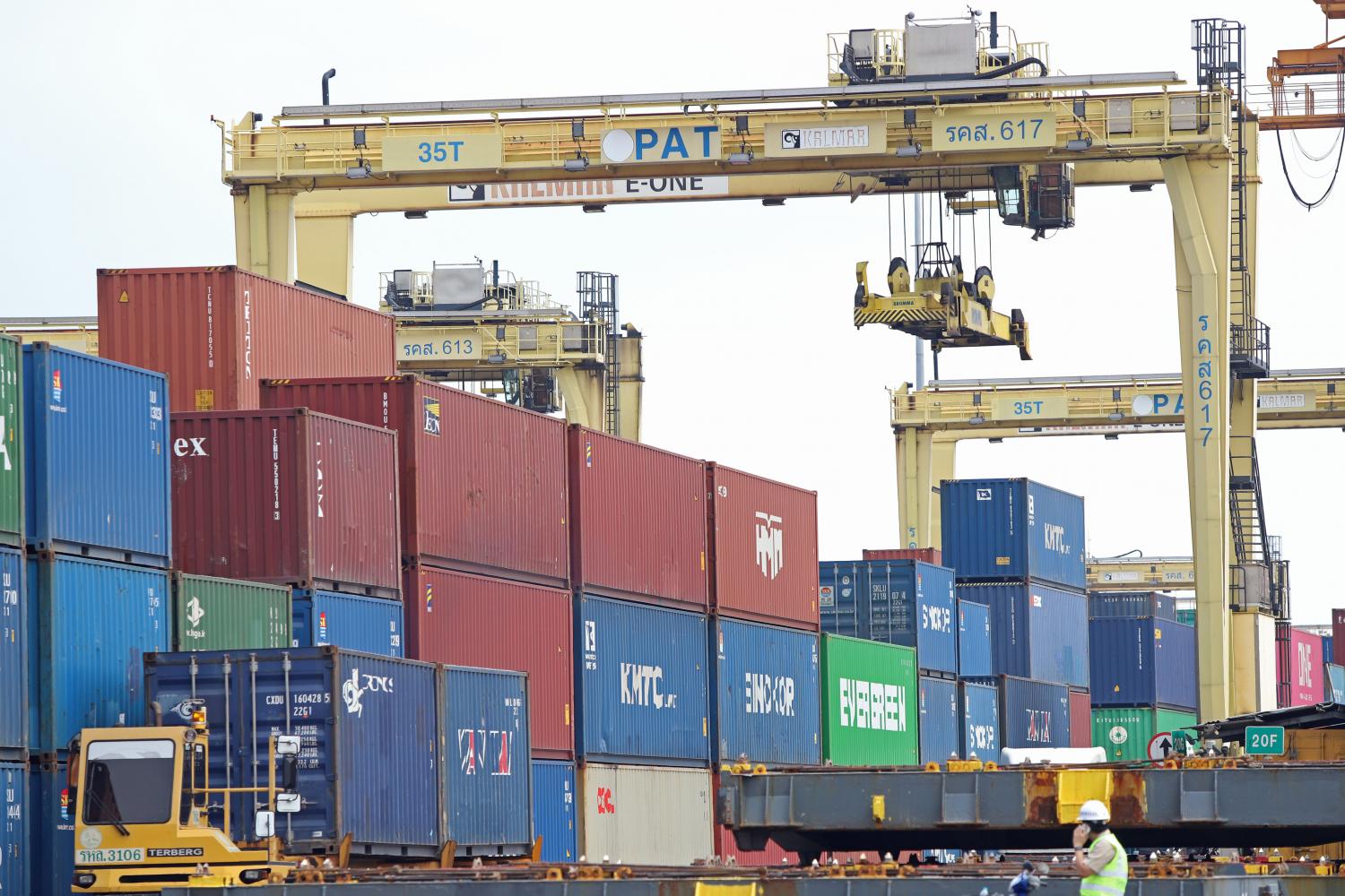 Containers are loaded onto a shipping vessel at Klong Toey port. Mr Pornchai says export growth is expected to slow this year in line with weak demand from major trading partners.