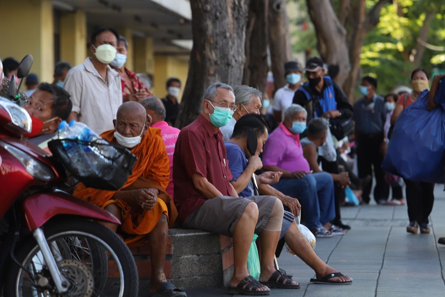 A group of elderly people in Bangkok's Phra Nakhon district. Thailand is set to become a super-aged society in 2034 when the elderly proportion of the population is expected to reach 28%. (Photo: Wichan Charoenkiatpakul)